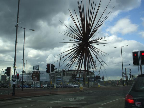 B of the broken.
The biggest peice of public art in UKOGBANI, the B of the Bang will sit outside Manchester's Commonwealth stadium for not a lot longer as enormous spikes of steel have dropped from it in high winds. It is widely believed that the B was misplaced and made from the wrong materials. Wrong colour too. It's a pity. I was looking foward to see a parachute display team impaled on it one day.